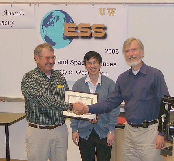 Photo of Bill Steele receiving the Barksdale Service Award.