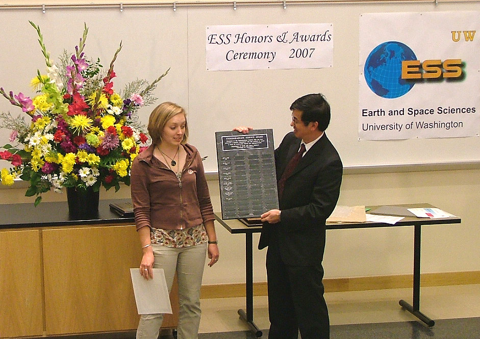 Photo of Tara Smiley receiving
	Undergrad Service Award.