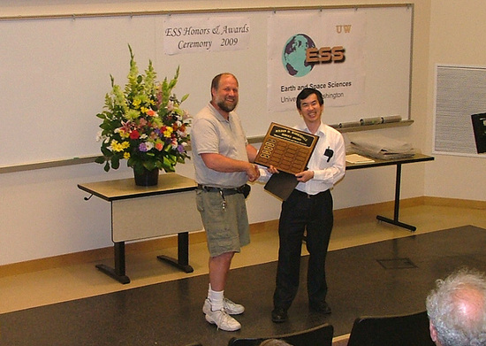 Photo of Ed Mulligan receiving the Barksdale Service Award.