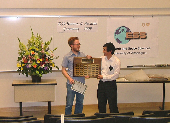 Photo of Peter Neff receiving Undergrad Service Award.